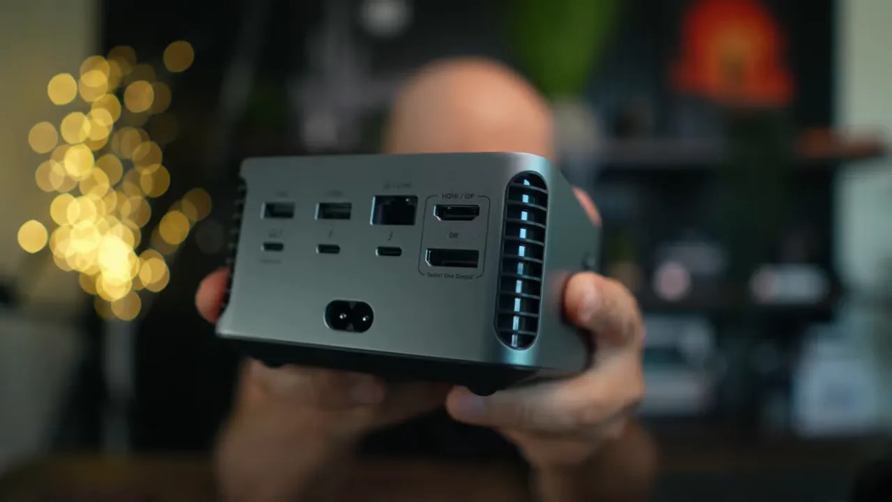 Close-up of the dock's rear panel showing USB ports, Ethernet, display connections, and power inlet