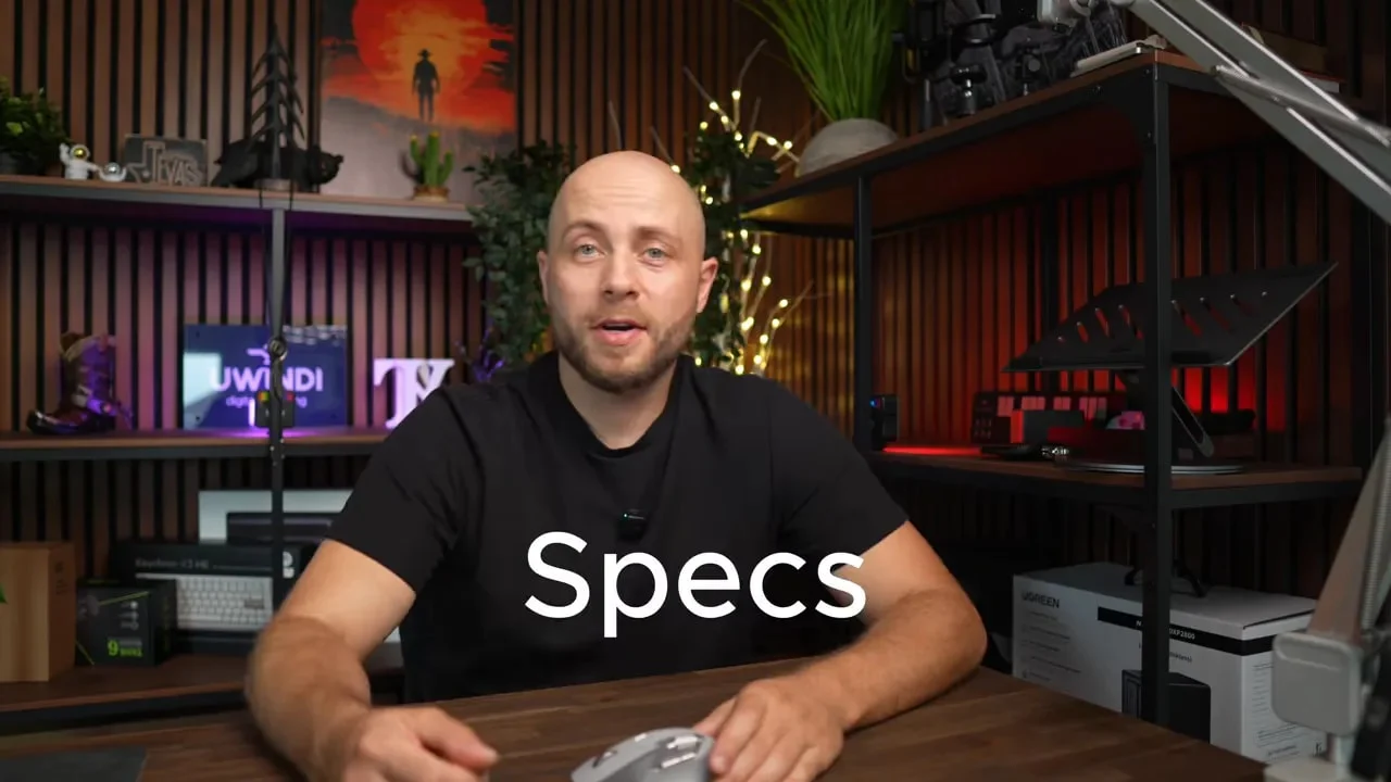 Presenter highlighting Rapoo MT760 Pro specs during comparison