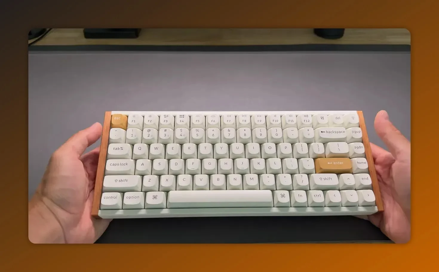Top-down view of the Keychron K2 HE showing white keycaps, tan escape/enter keys, and wooden side panels.